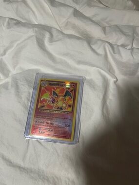 Pokemon Charizard Trading Card - Red, Yellow, Orange